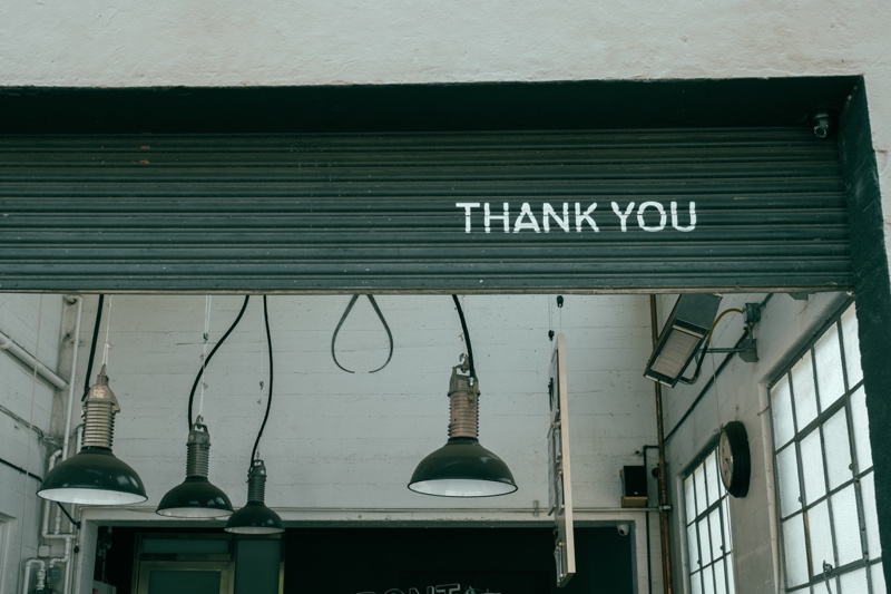 thank you sign with light fixtures